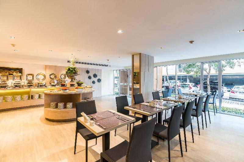 The Grass Serviced Suites by At Mind - Restoran