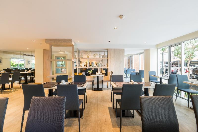 The Grass Serviced Suites by At Mind - Restoran