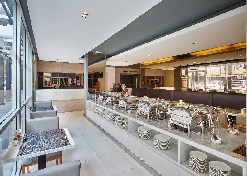 The Grass Serviced Suites by At Mind - Restoran