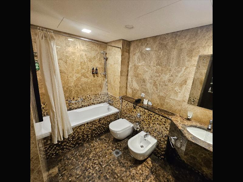 Tulip Creek Hotel Apartment - Oda