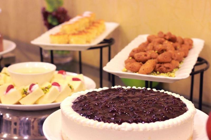 City Rose Hotel Suites - Restoran