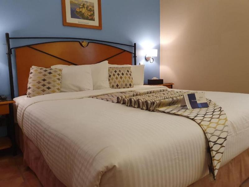 Mena Holiday Beach Resort Half Moon Bay - Oda