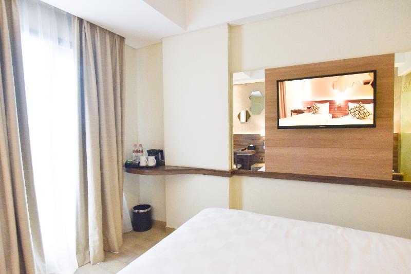 Golden Tulip Essential Tangerang - Oda