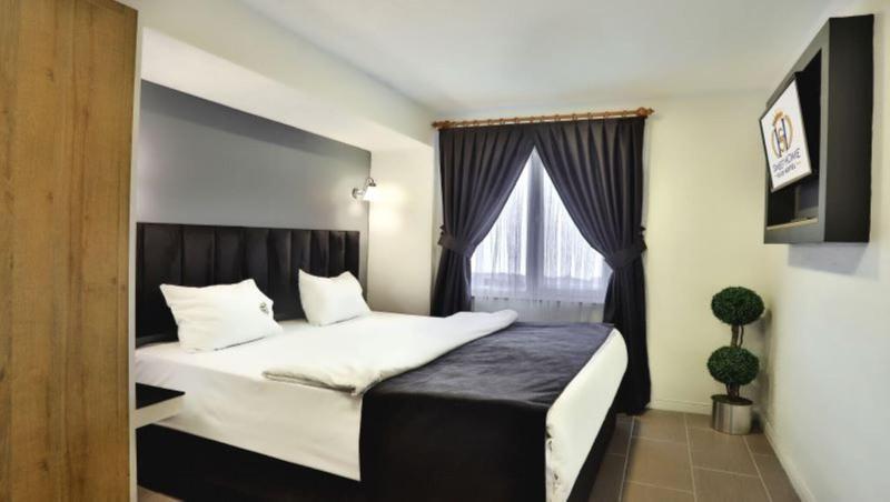 Sweet Home Suite Hotel - Oda