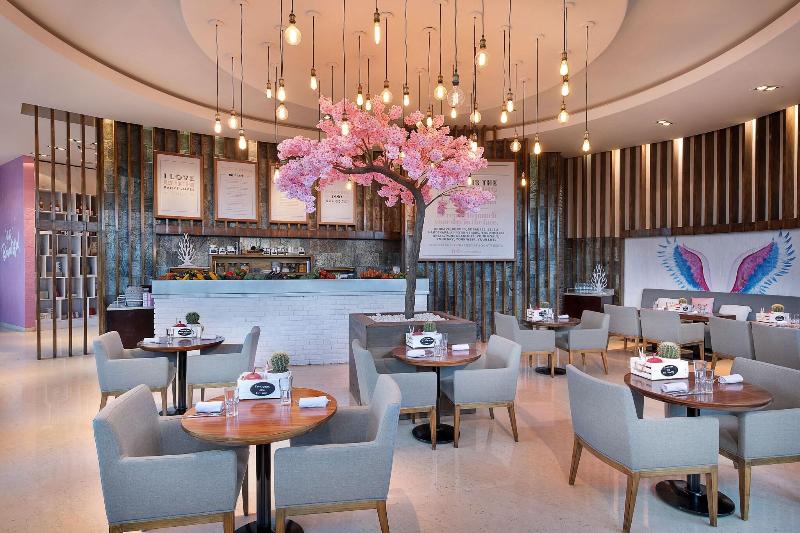 Le Meridien Mina Seyahi Beach Resort & Marina - Restoran