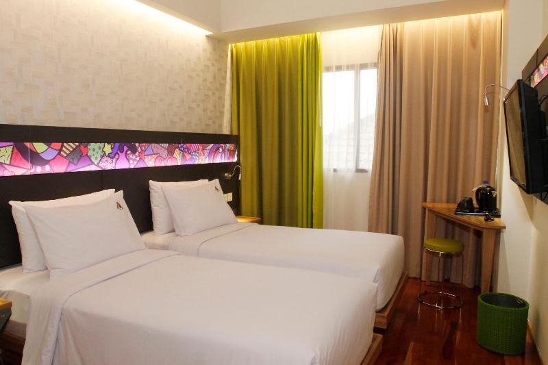 Maxone Hotel Dharmahusada - Oda