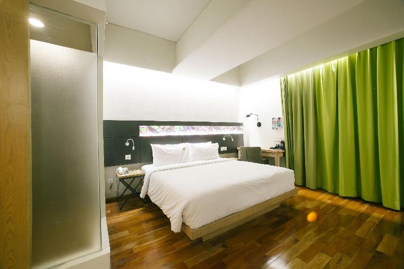 Maxone Hotel Dharmahusada - Oda