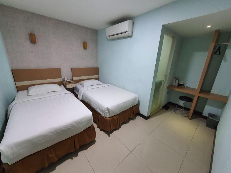 Amaliun Hotel Medan - Oda