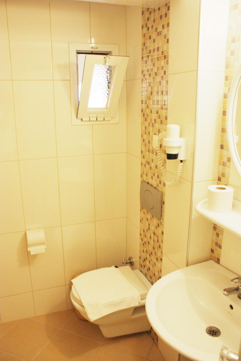 Toloman Hotel & Apartments - Oda
