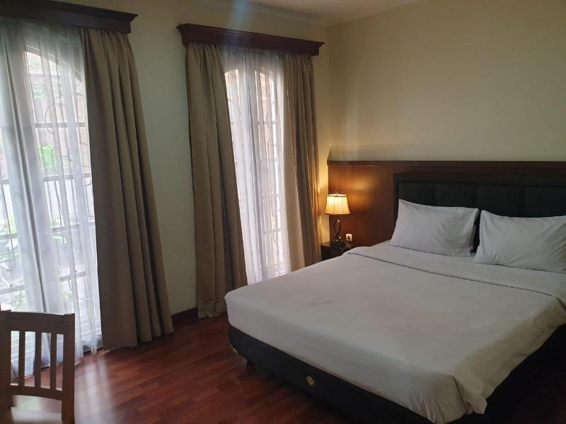 Arimbi Pejaten Suites - Oda