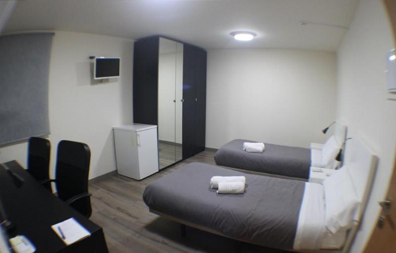Hostal Europa House Village - Oda