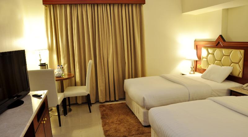 Saffron Hotel LLC - Oda
