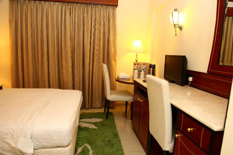 Saffron Hotel LLC - Oda