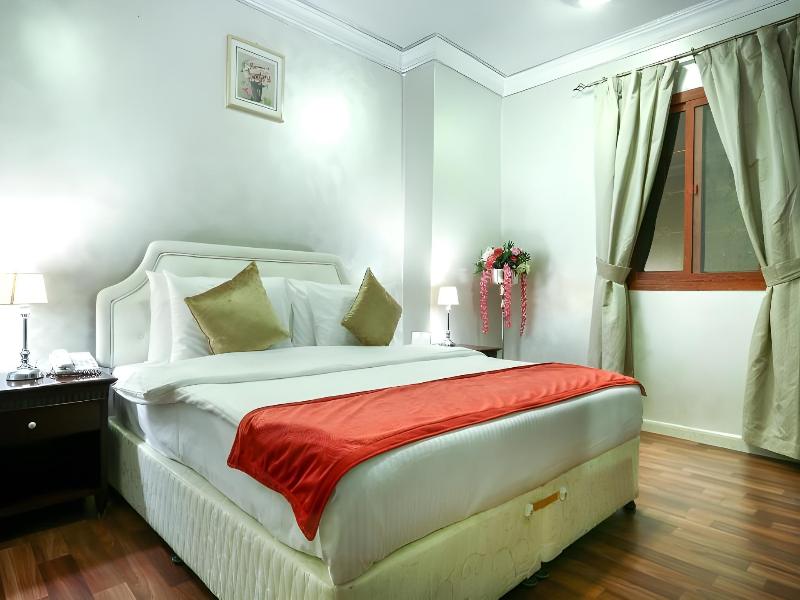 La Villa Suites Hotel - Oda