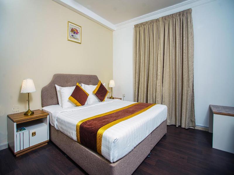 La Villa Suites Hotel - Oda