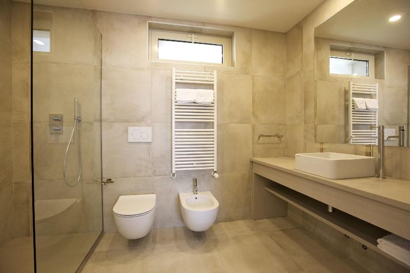 Al Campanile Aparthotel & Suite - Oda
