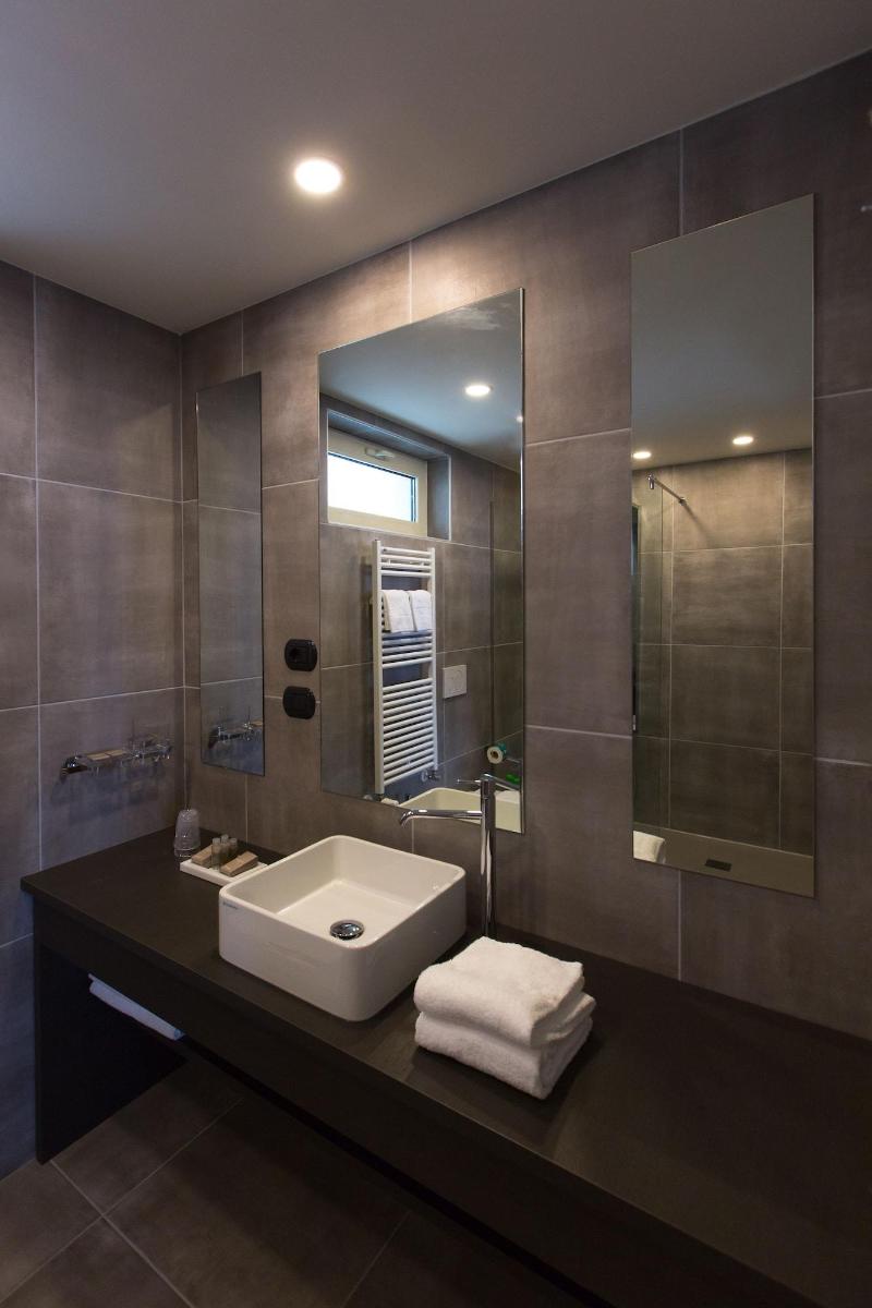 Al Campanile Aparthotel & Suite - Oda