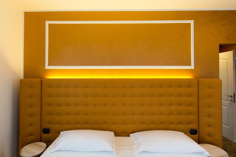 Al Campanile Aparthotel & Suite - Oda