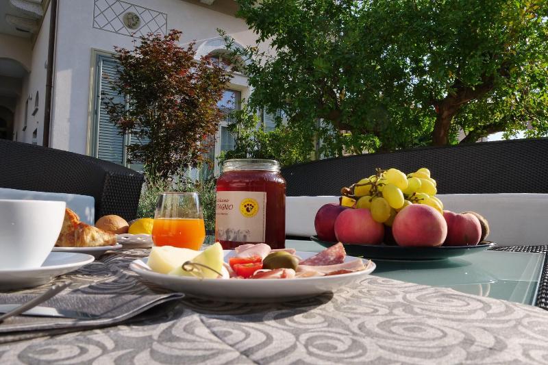 Al Campanile Aparthotel & Suite - Restoran