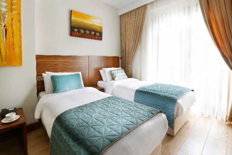 The White Orient Hotel - Oda