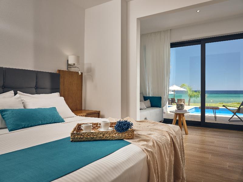 Cavo Orient Beach Hotel & Suites - Oda