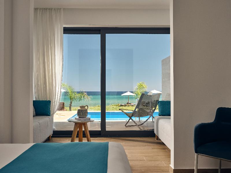 Cavo Orient Beach Hotel & Suites - Oda