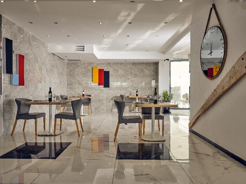 Cavo Orient Beach Hotel & Suites - Restoran