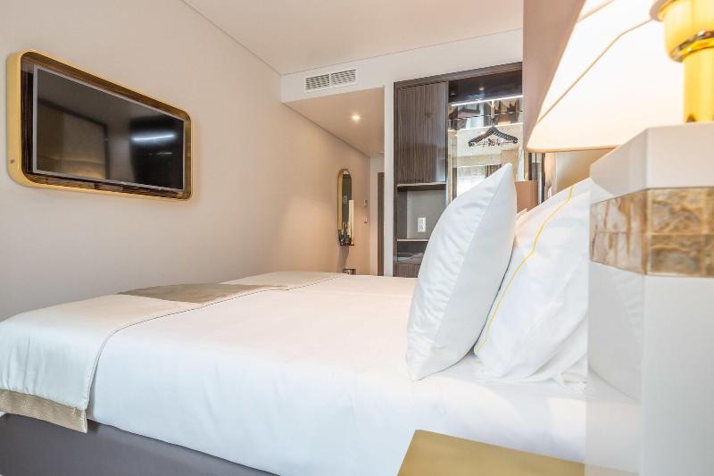 Meraprime Gold Design Hotel - Oda