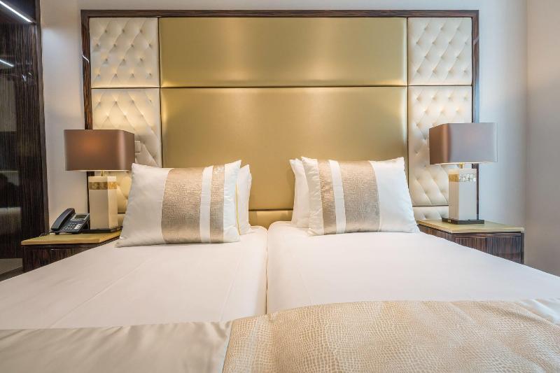 Meraprime Gold Design Hotel - Oda