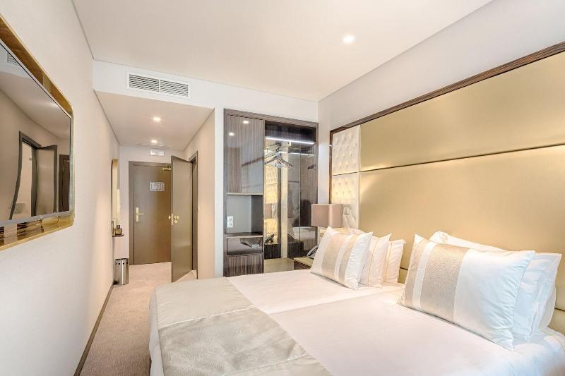 Meraprime Gold Design Hotel - Oda