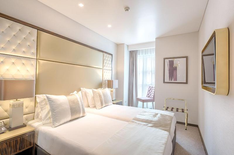 Meraprime Gold Design Hotel - Oda