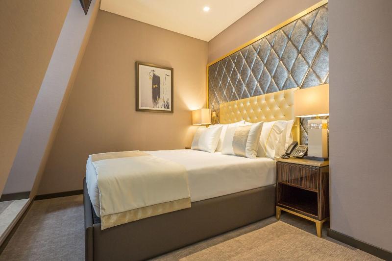 Meraprime Gold Design Hotel - Oda