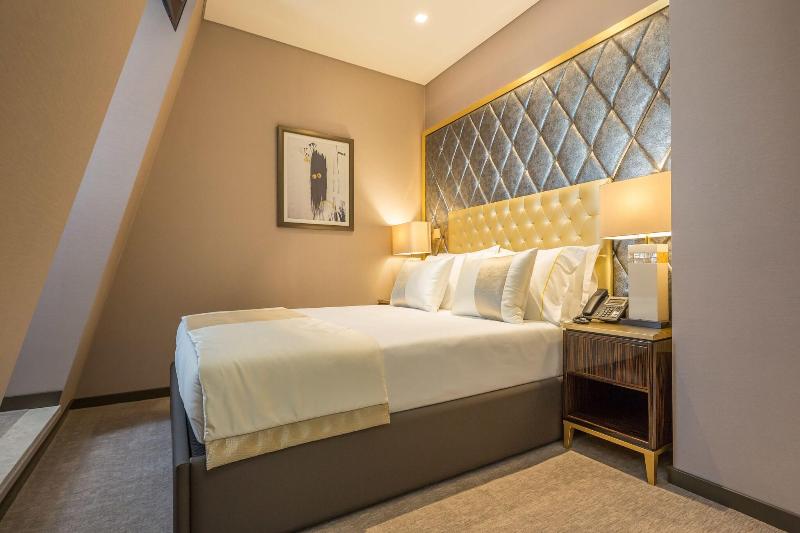 Meraprime Gold Design Hotel - Oda