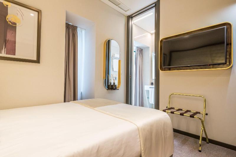Meraprime Gold Design Hotel - Oda