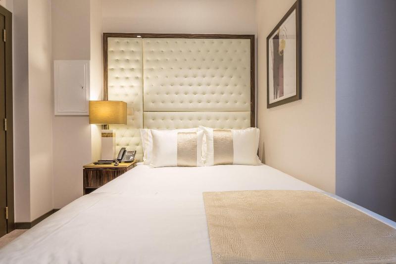 Meraprime Gold Design Hotel - Oda