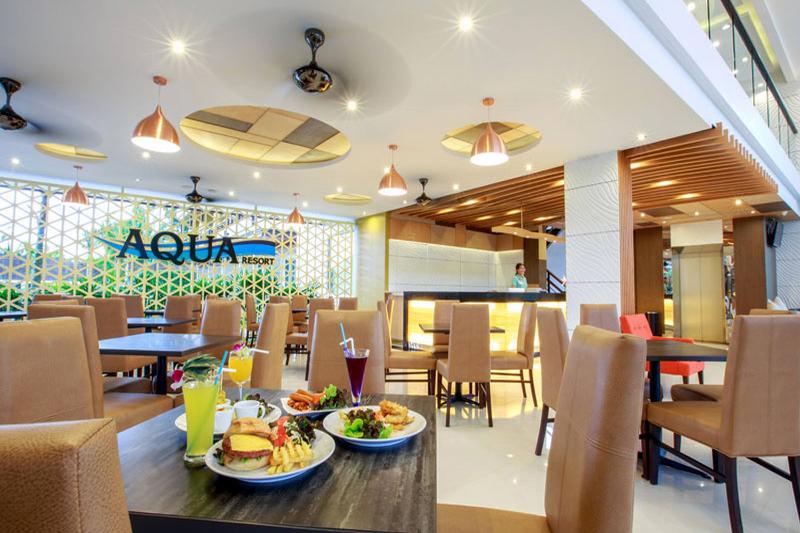 Aqua Resort Phuket Near Beach by ZUZU - Restoran
