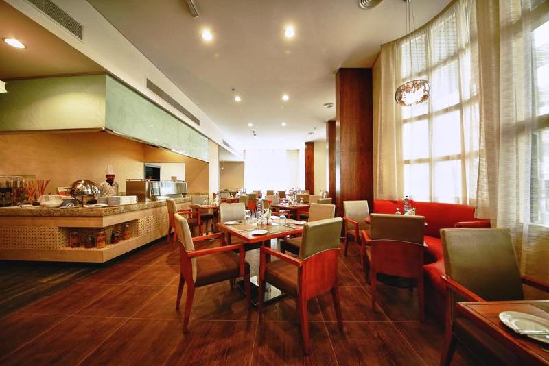 Lavender Hotel by Gloria Hotels and Resorts - Restoran