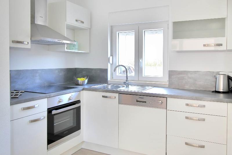 Bacan Family Apartments - Oda