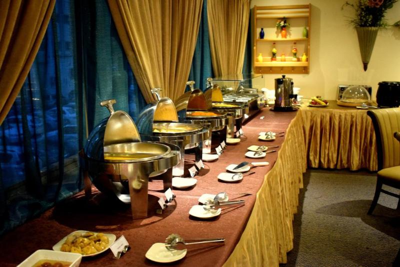 Nejoum Al Emarate Hotel Sharjah - Restoran