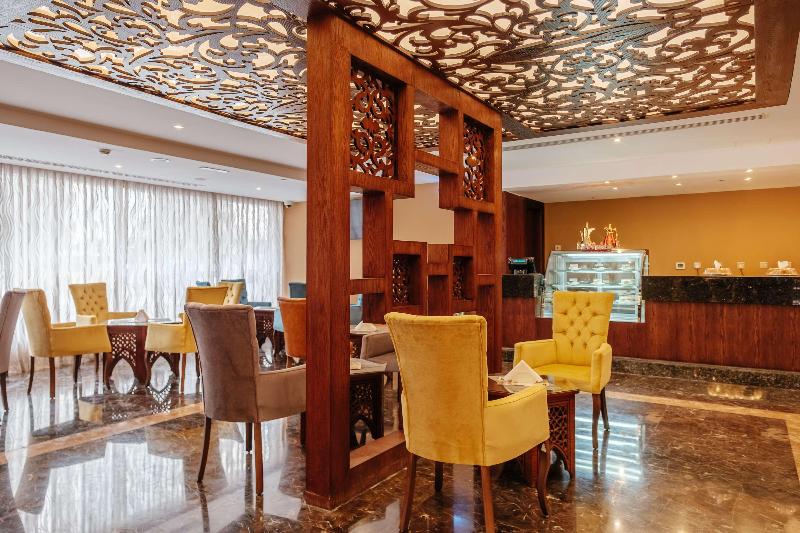 Crystal Plaza Al Majaz Ex Tulip inn al Khan Hotel - Restoran