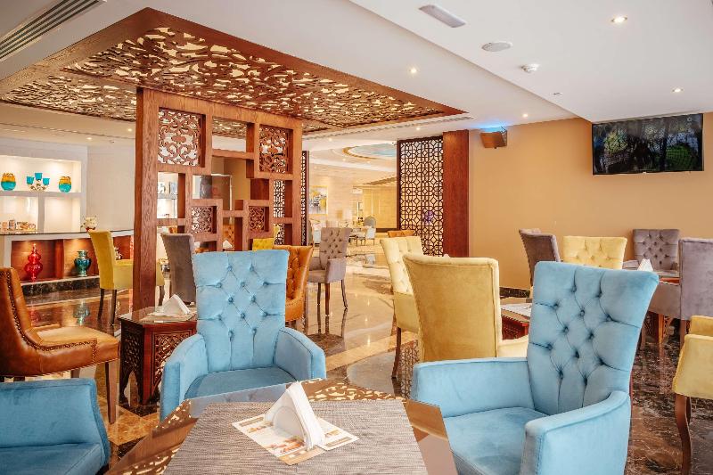 Crystal Plaza Al Majaz Ex Tulip inn al Khan Hotel - Restoran