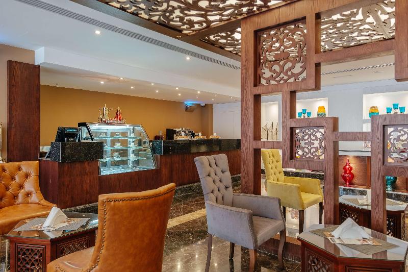 Crystal Plaza Al Majaz Ex Tulip inn al Khan Hotel - Restoran