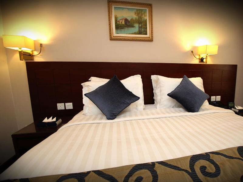 Rawdat Al Aqeeq Hotel - Oda
