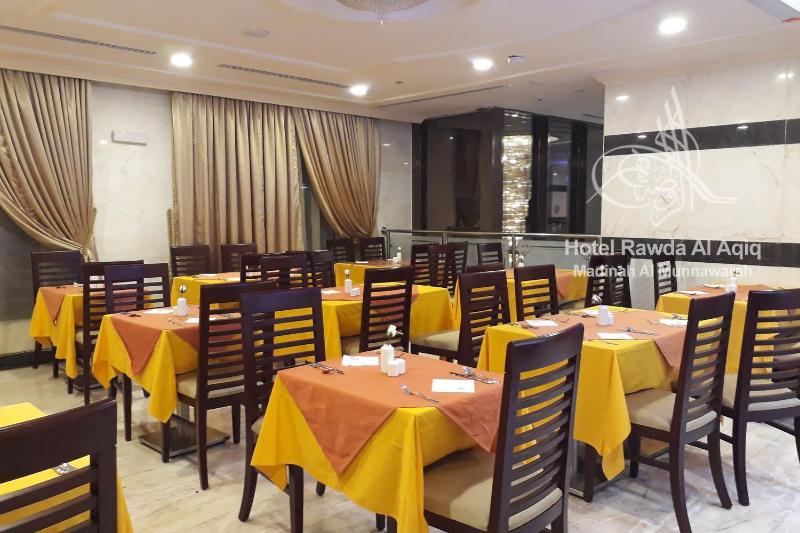 Rawdat Al Aqeeq Hotel - Restoran