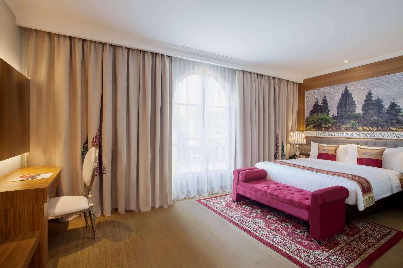 Ramada Suites by Wyndham Solo - Oda