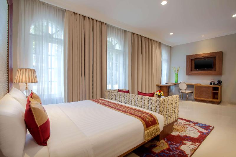 Ramada Suites by Wyndham Solo - Oda