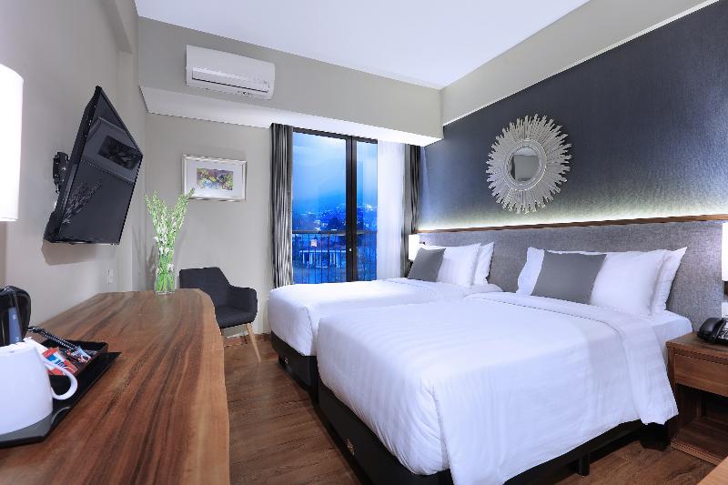 Aston Inn Batu - Oda