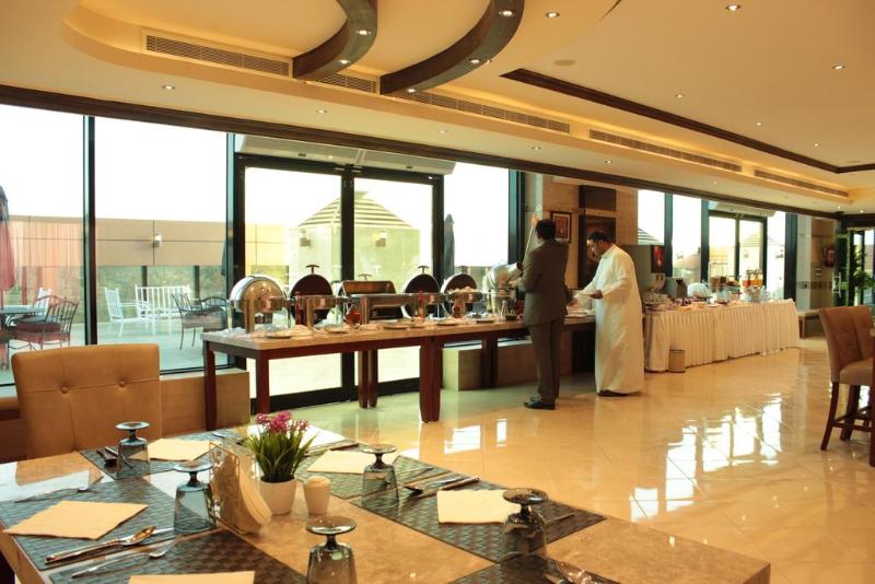 Platinum Suites Hotel Apartments - Restoran