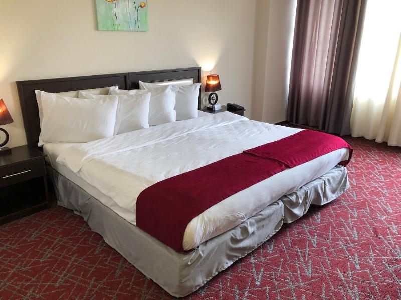 The Signature Hotel - Oda