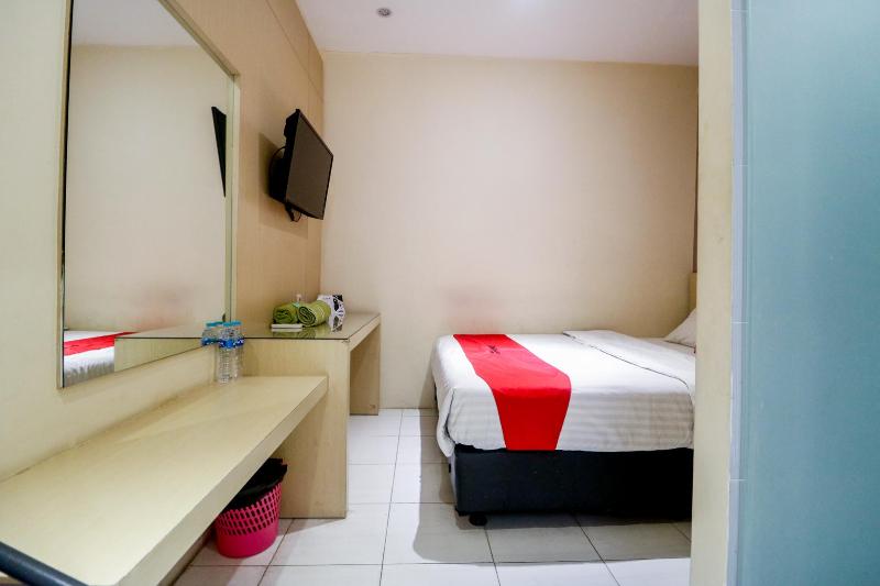 RedDoorz near Pasar Tarapung Siring Banjarmasin - Oda